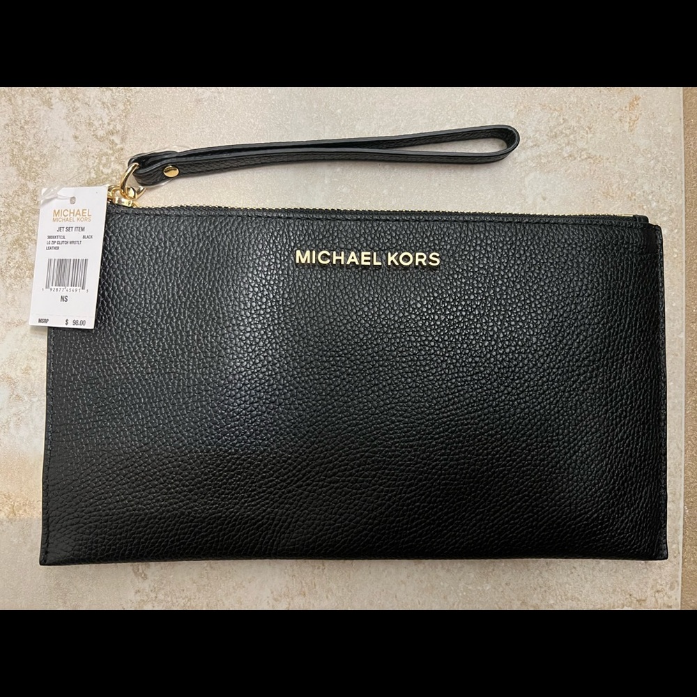 Brand new Michael Kors black leather wristlet